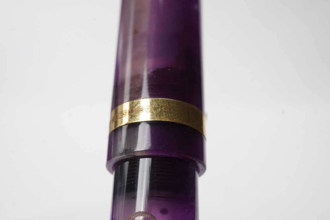 A modern Conway Stewart 'Duro' in stunning purple fitted with 18ct. gold medium nib